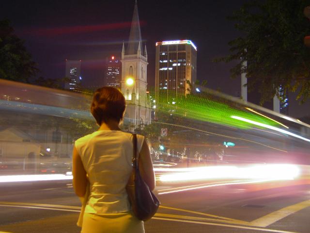 A Woman Waiting at Lights