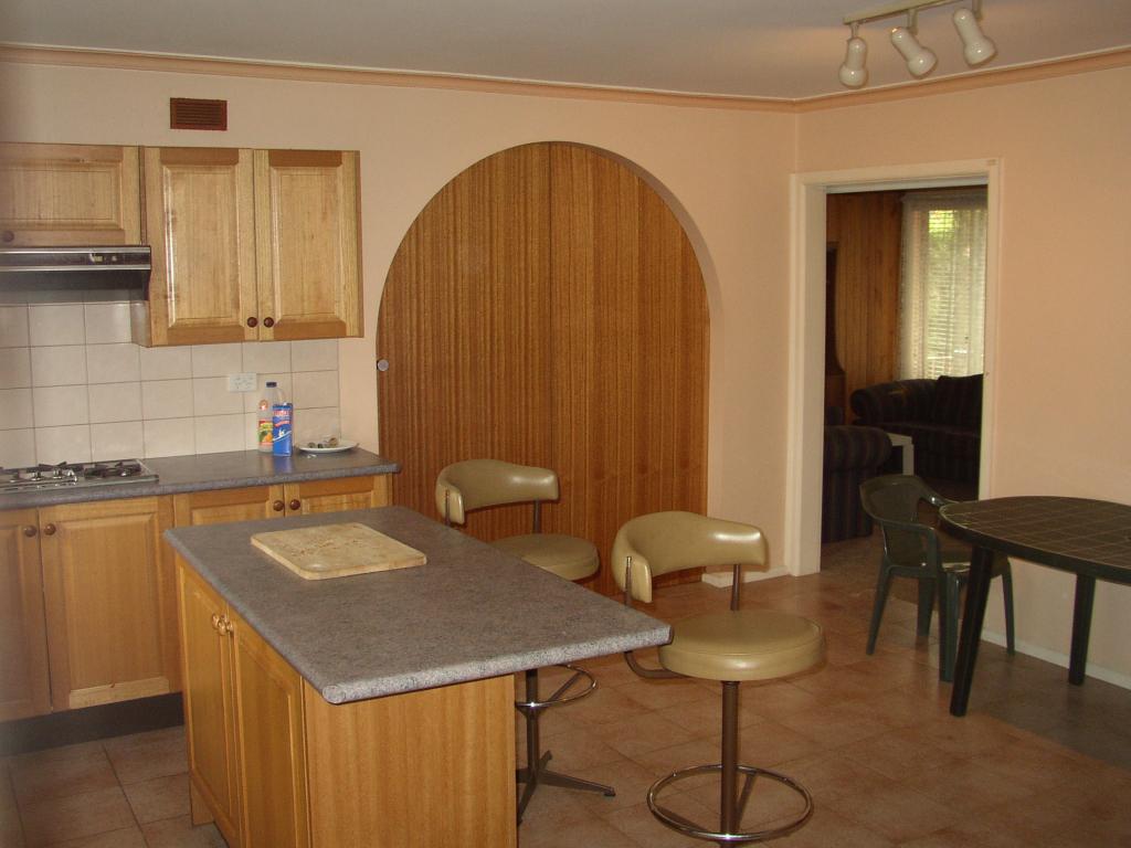 Kitchen with bar stools