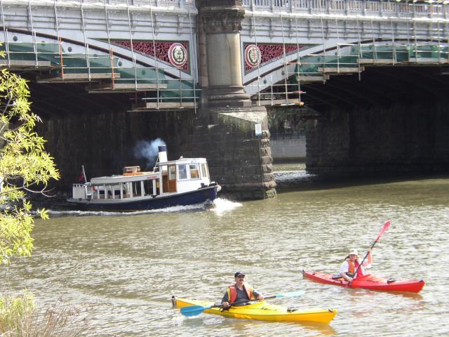 Steamboat and kayaks